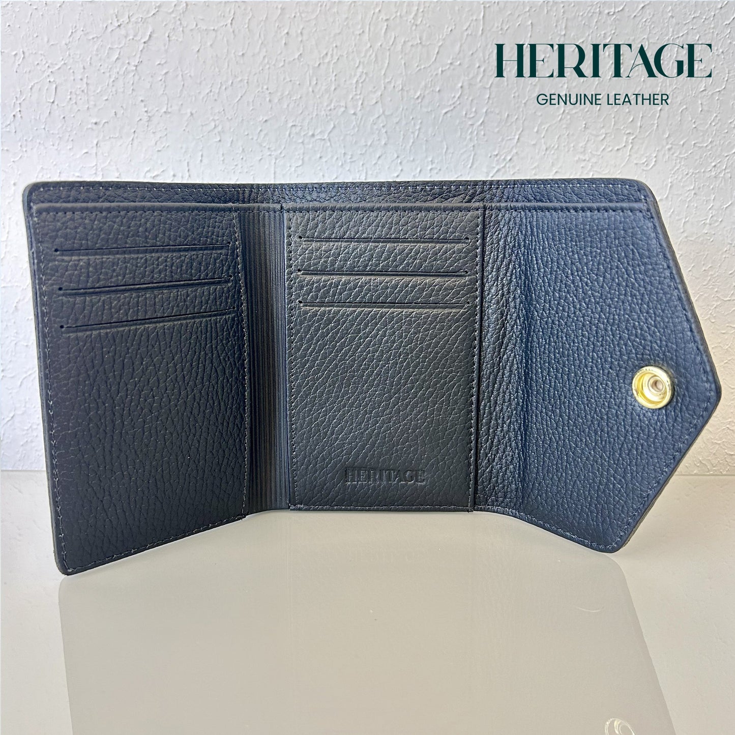 Billetera Vertical con Broche Cuero Granulado Negro Heritage